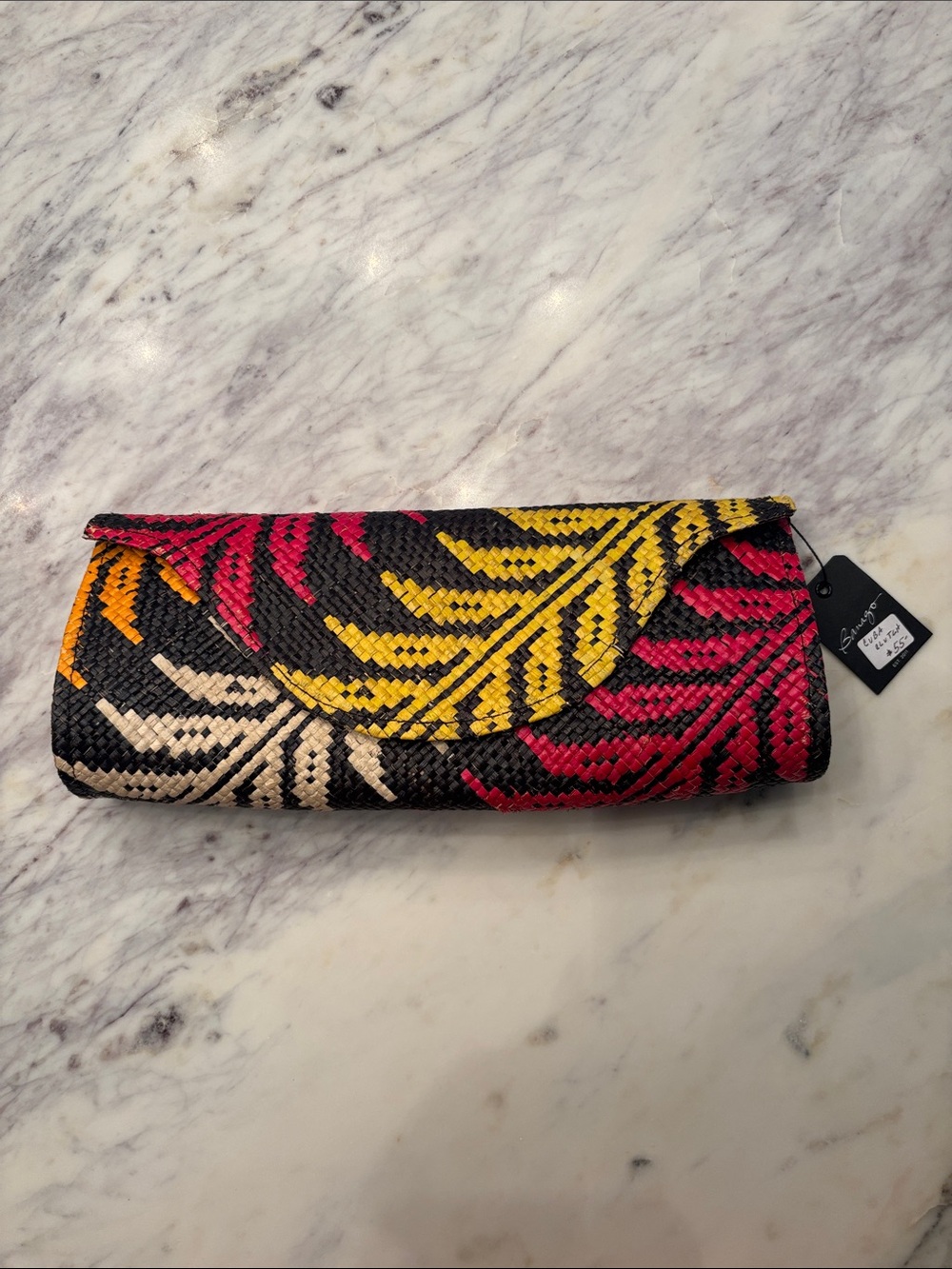 Banago Cuba clutch woven black red yellow white orange leaves NWT